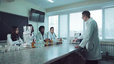 The tutor explaining chemistry