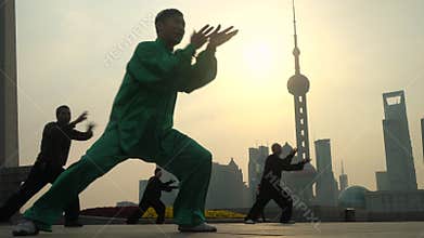 Group exercising with Tai Chi on The Bund, Shanghai