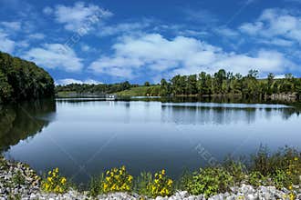 Peaceful lake in green spring summer
