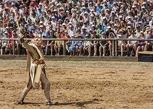 Brave and vaillant knight defeating his enemy against a wall of