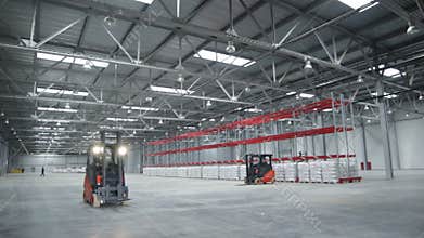 Cargo Machine Moves in Spacious Warehouse