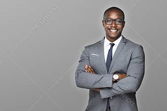 Cheerful african american businessman with a charming smile accomplished proud and successful