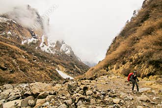 Woman backpacker traveling hiking in mountains Travel Lifestyle success concept adventure active summer vacations outdoor mountain