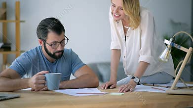 Freelancer in casual working on serious project together