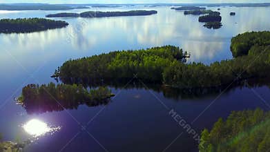 Aerial shot of beautiful islands at lake on a calm summer day.