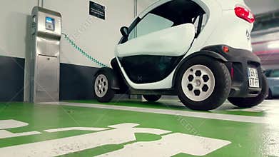 Renault Twizy Electric Car in Charge in an Underground Parking
