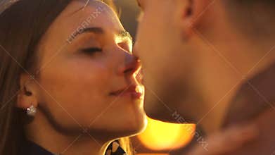 Portrait of a beautiful couple in the light of a spotlight in love