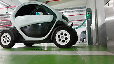 Renault Twizy Electric Car in Charge in an Underground Parking