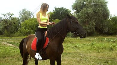 Happy beautiful lady rides on horseback