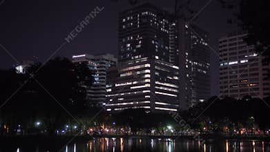 BANGKOK,THAILAND- CIRCA March 2017: Night veiw of skyscrapers in Lumpini park