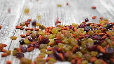 Sweet dried fruits in wooden spoon