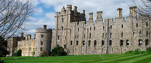 View of Windsor Castle walls and tower with arched windows, England