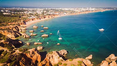 Aerial view of cliffs and beach Praia in Portimao, Algarve region, Portugal