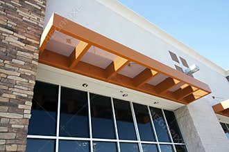 Modern metal awning over storefront