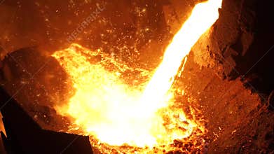 Liquid metal from blast furnace. Liquid iron from ladle in the steelworks