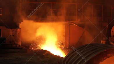 Liquid metal from blast furnace. Liquid iron from ladle in the steelworks