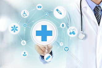 Doctor hand touching first aid sign on virtual screen