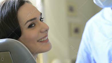 Smiling woman at dentist