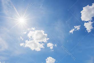 Blue sky and cloud with bright sun star flare background