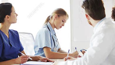 Group of doctors on seminar or lecture at hospital