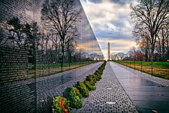 Vietnam War Memorial with Washington Monument at Sunrise, Washington, DC, USA
