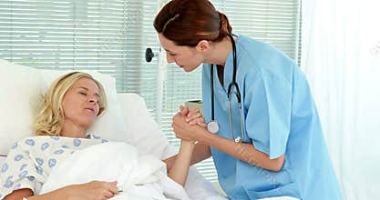 Doctor speaking with her patient
