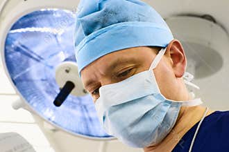 Look of surgeon with lamp