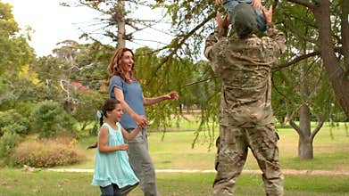 Happy soldier reunited with his family