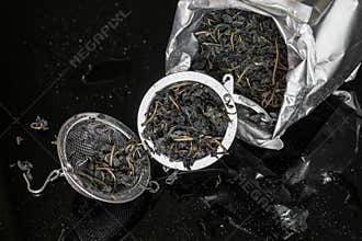 Dry tea and strainer, preparing for brew up