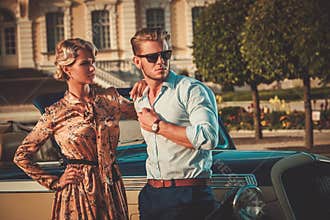 Couple near classic car
