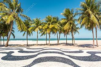 Palm trees and the iconic Copacabana beach mosaic sidewalk