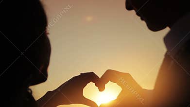 Hands of men and women came together form the