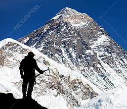 Mount Everest from Kala Patthar and silhouette of man