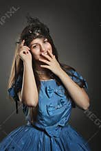 Smiling woman in blue princess dress