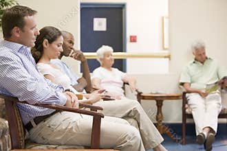 Five people waiting in waiting room