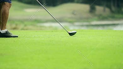 Golfer shooting golf