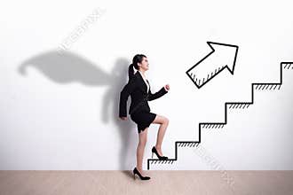 Superhero business woman with stair