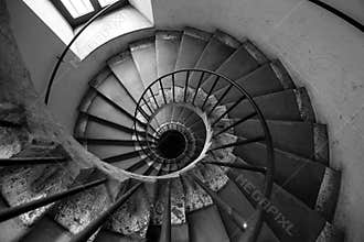 Spiral stairs, black and white. Architecture old Italian palace.