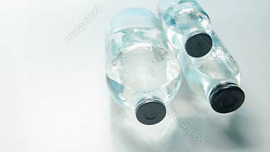 Horizontal dolly shot of medical bottles in lab