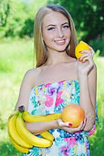 Happy girl and healthy vegetarian food, fruit