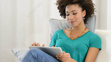 Woman using digital tablet