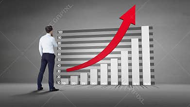 Businessman watching progress graph with arrow