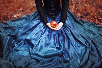 Snow White princess with the famous red apple