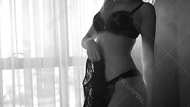 woman blonde on the bed