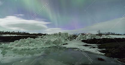 Northern Lights above mountain range