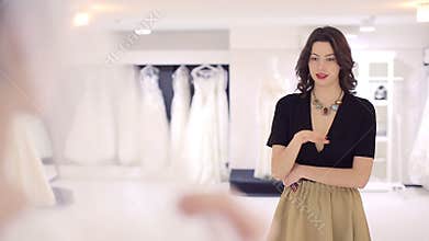 Girlfriend appreciates wedding dress