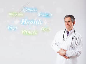 Clinical doctor pointing to health and fitness collection of words
