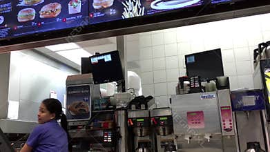 People ordering coffee at mcdonalds check out counter