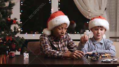 Christmas kids playing with toys.