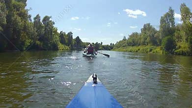The kayak floats the river